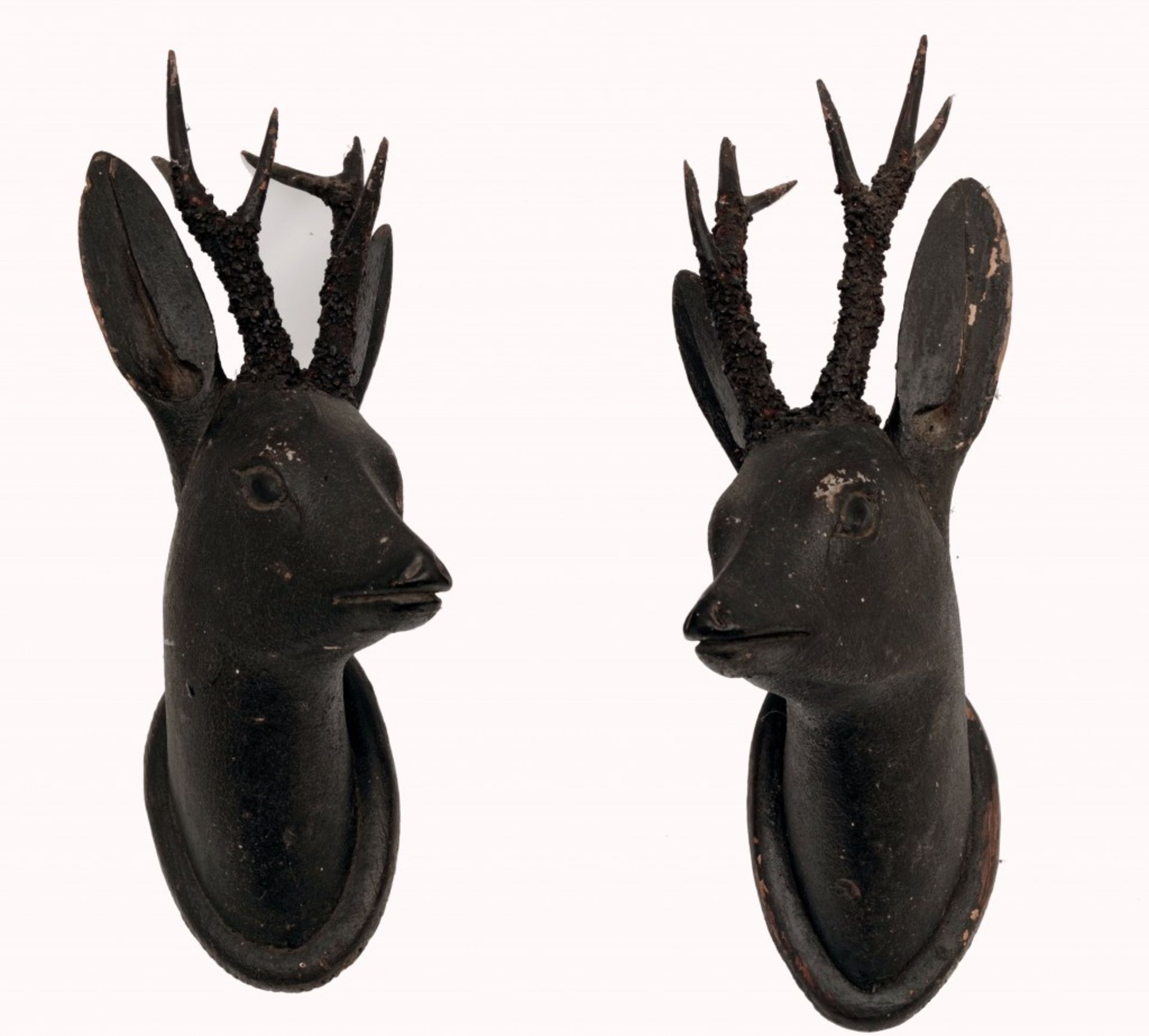 A Black Forest Carved Deer Heads