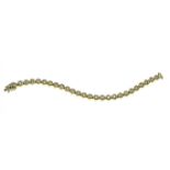 Tennisarmband, 18 kt Gelbgold, um 1980, besetzt mit 26 Brillanten, zusammen ca 3 ct., Gew. 32,5 g,