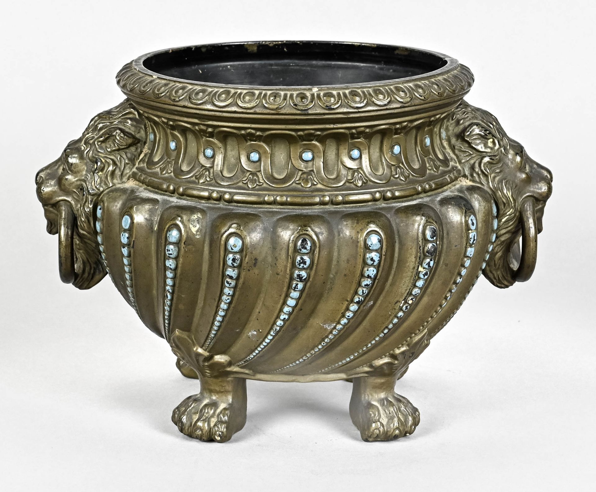 Cachepot, German around 1880, on paw feet, bronzed clay, lion heads on the sides as handle, height 