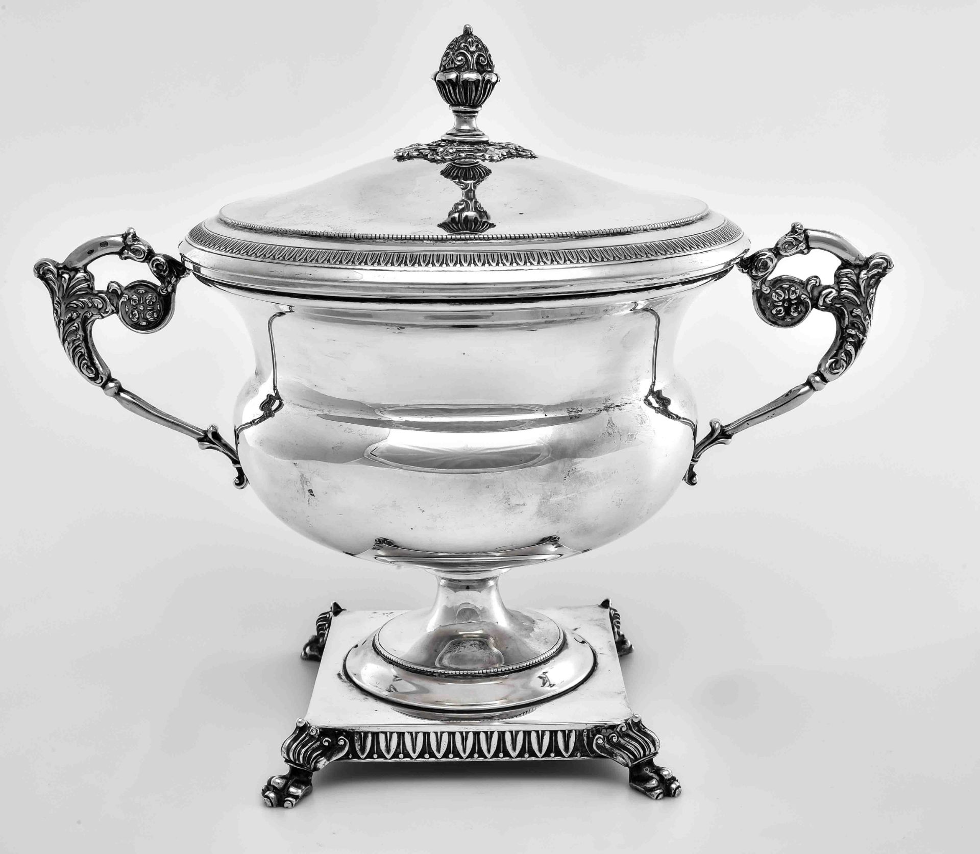 Lidded tureen, Germany circa 1900, silver, hallmarked 800, decorated handles, on four paw feet, dec