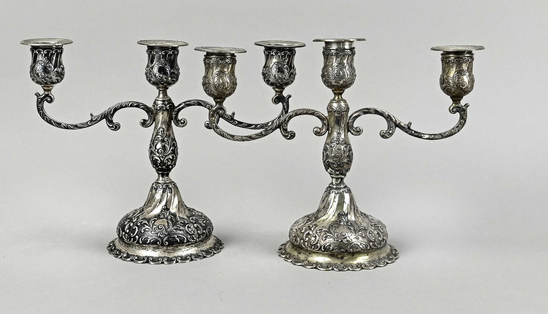 Pair of candlesticks, silver 800, 3-lights each, roccaille, grommets added later, all hallmarked wi