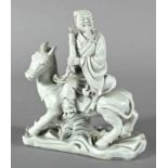 Chinesisches Weißporzellan, "Gelehrter mit Schriftrolle auf dem Pferd", Porzellan, weiß glasiert, a