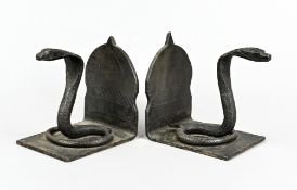Bookends, decorated with cobra figures, cast iron, surface decorated, 12 x 12 x 9 cm