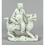 Porzellanfigur, "Chinese auf Drachen", China, weißes Porzellan glasiert, Höhe 22,5 x 20 cm, In der