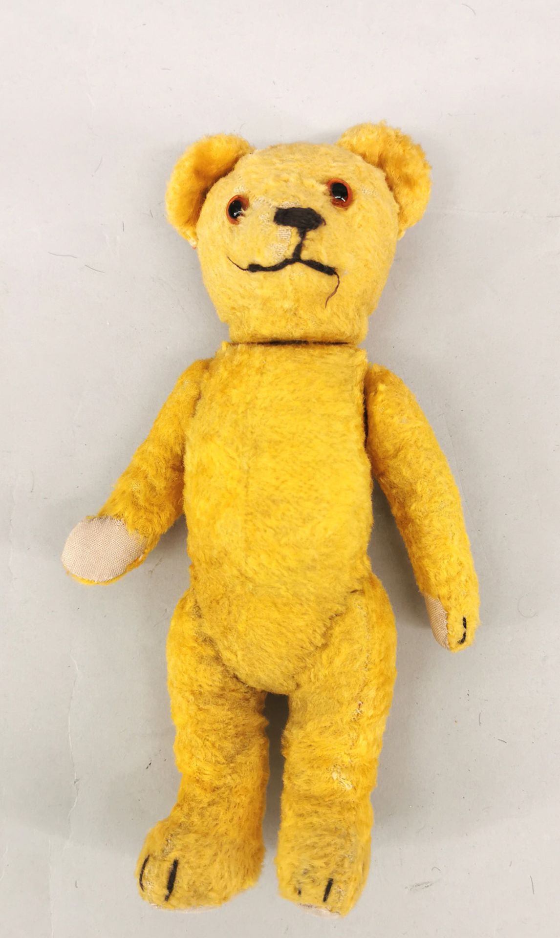 kleiner alter Teddy