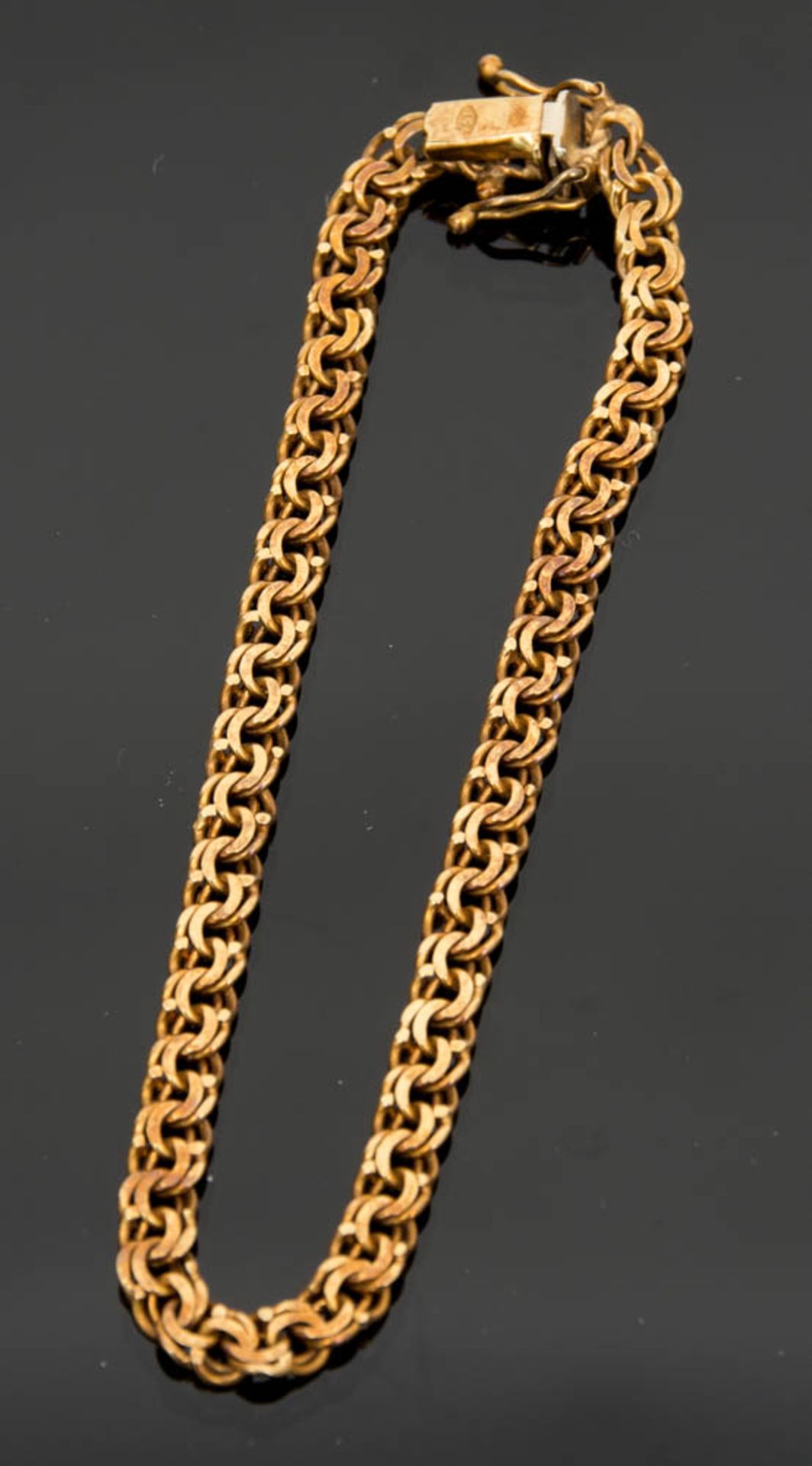 Goldenes Gliederarmband, 750er Rotgold.Gesamtgewicht: 8,9 g.