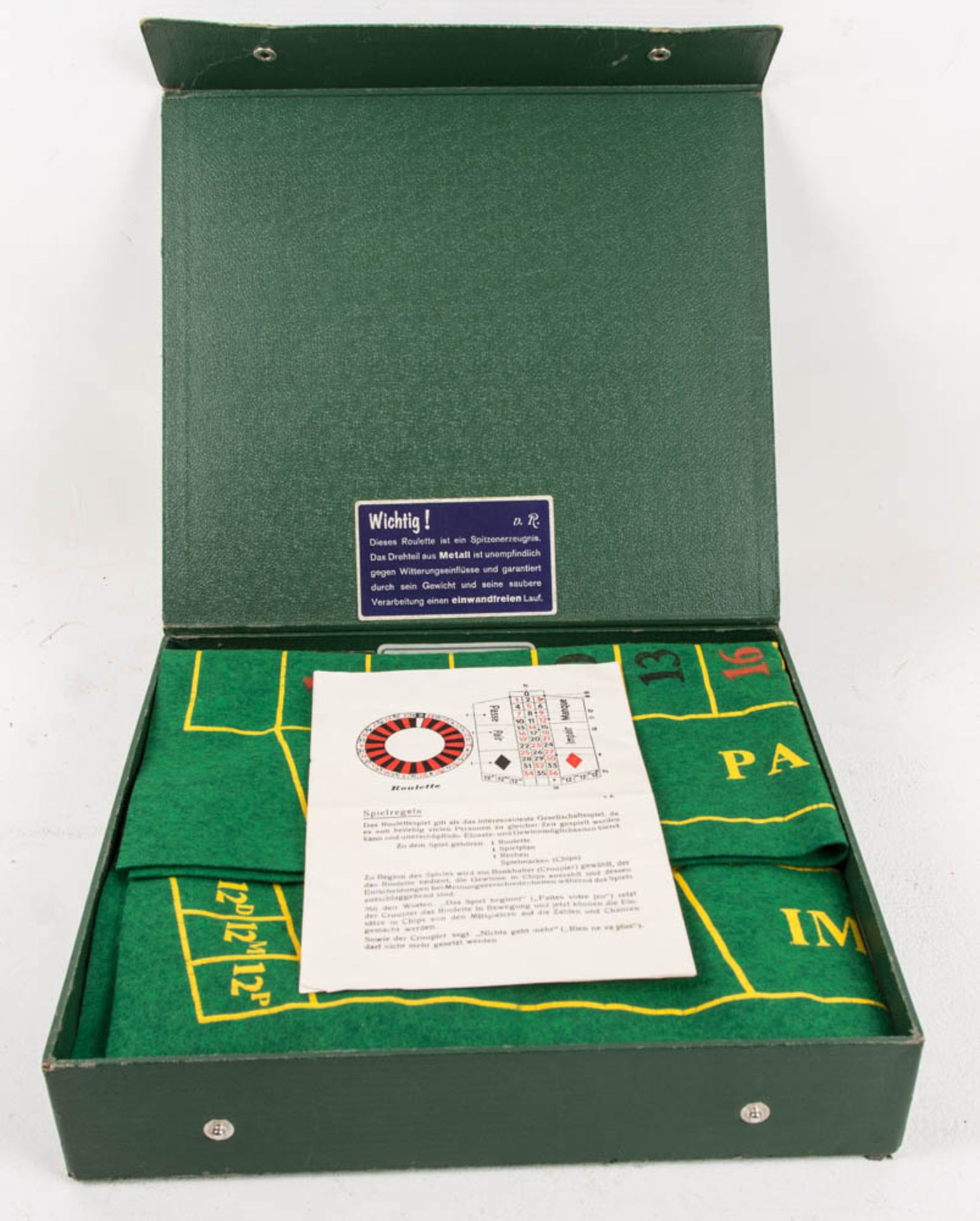Roulette Glücksspiel in grünem Koffer.