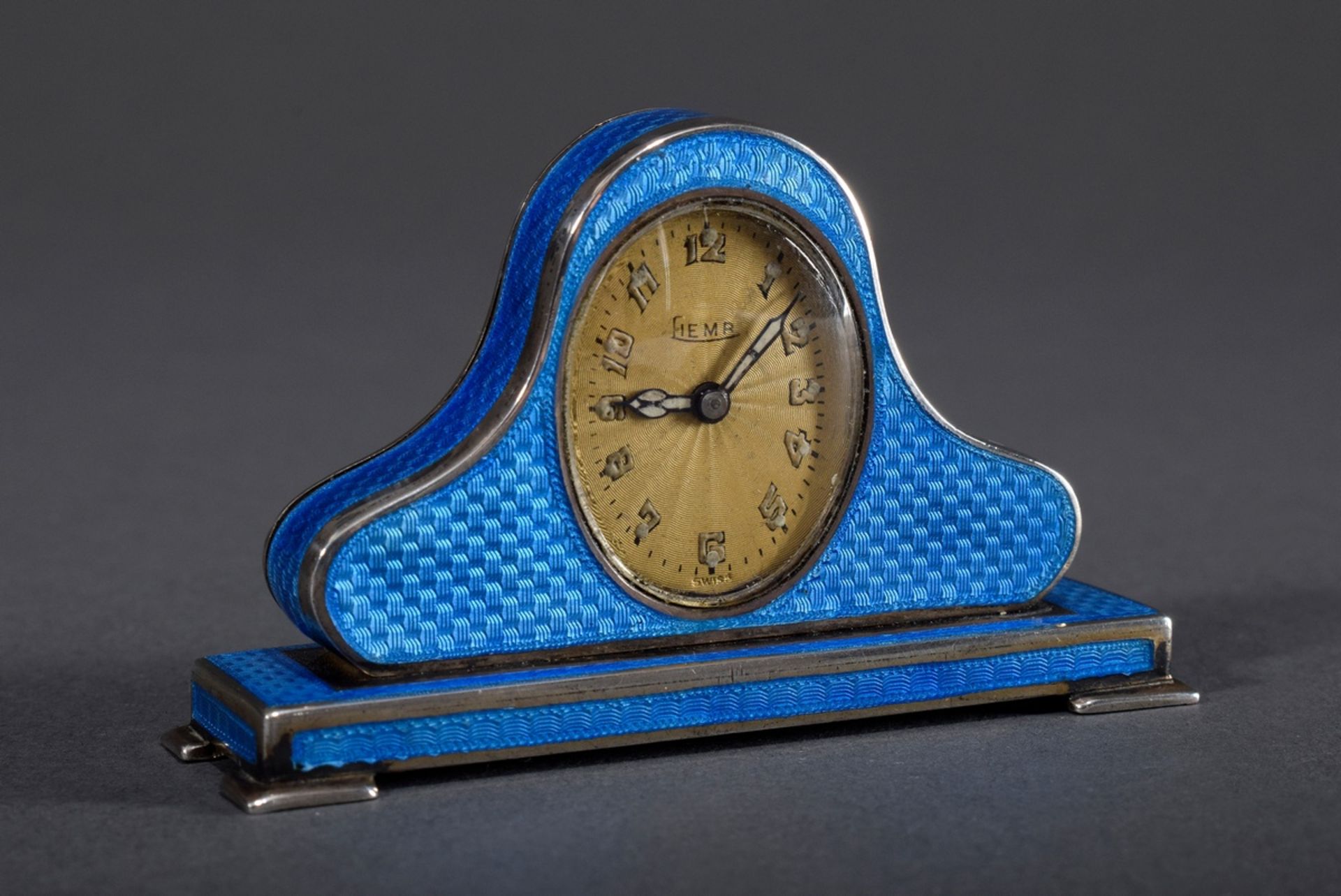 Miniatur Tischuhr in ovoidem Gehäuse mit blauem | Miniature table clock in oval case with blue gui