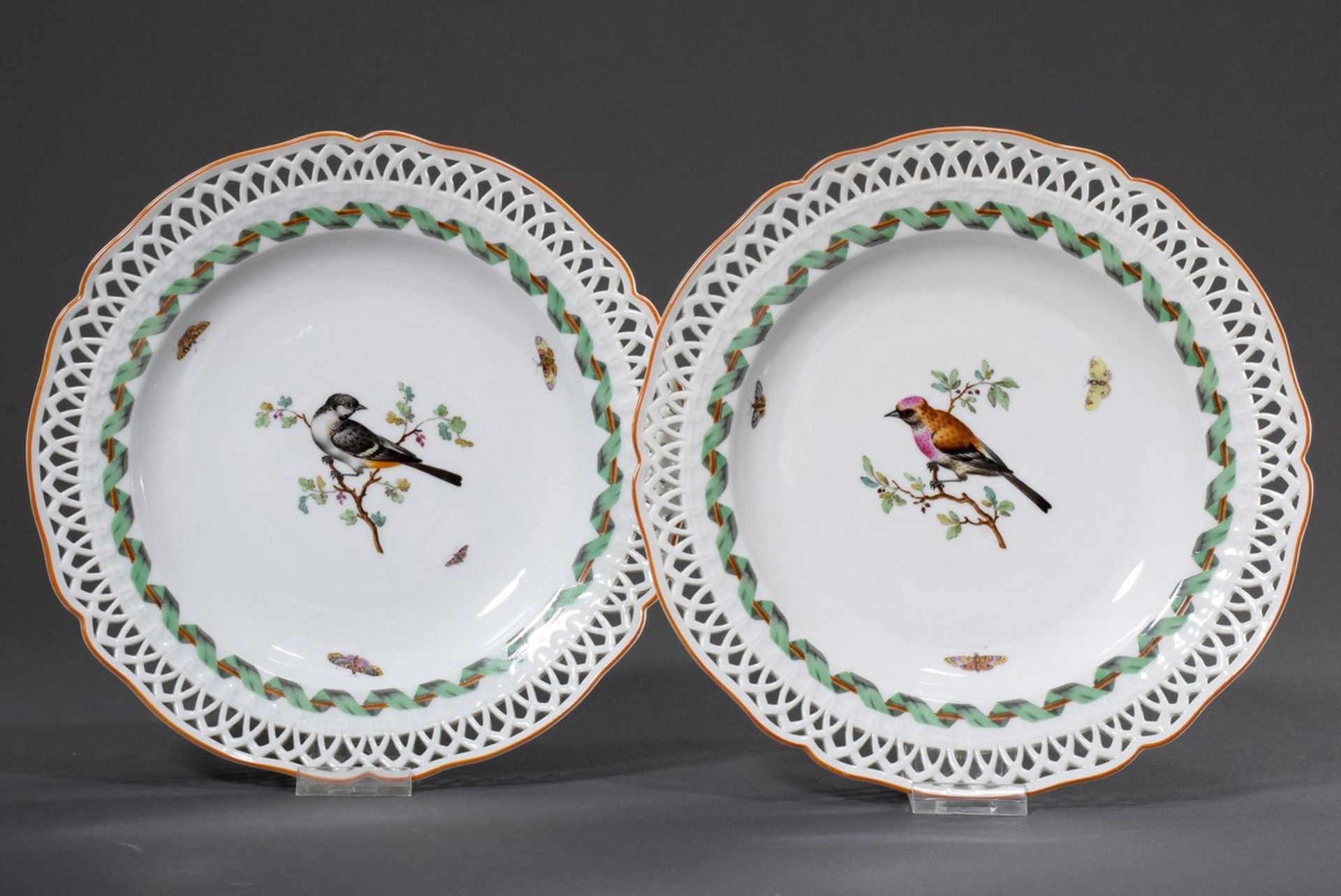 Pair of early KPM plates with openwork rim and polychrome painting "Birds and Butterflies" and "Gre