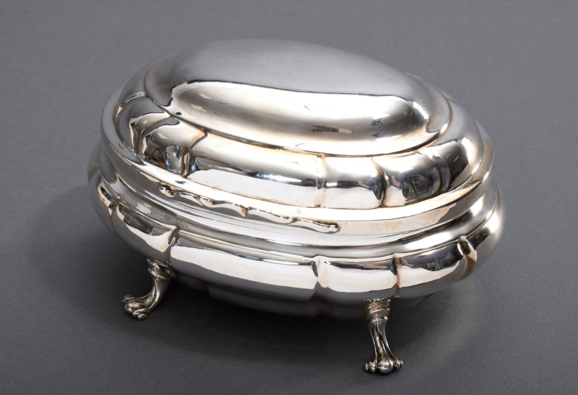 Oval baroque sugar bowl with sparsely decorated body on feet, MM / inspection indistinct, silver, 3
