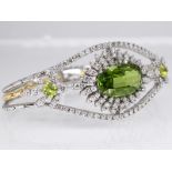 Prunkvolles Armband mit Peridot und Brillanten, zus. ca. 5,5 ct, 70- er Jahre 750/- Weiß- und