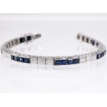 Streifenarmband mit 24 natürlichen Saphiren und 18 Altschliff-Diamanten, zus. ca. 2,6 ct, 80- er J