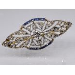 Nadel mit kleinen Saphir-Carrées und Diamanten, zus. ca. 0,6 ct, Art Deco. 585/- Weiß-und Gel