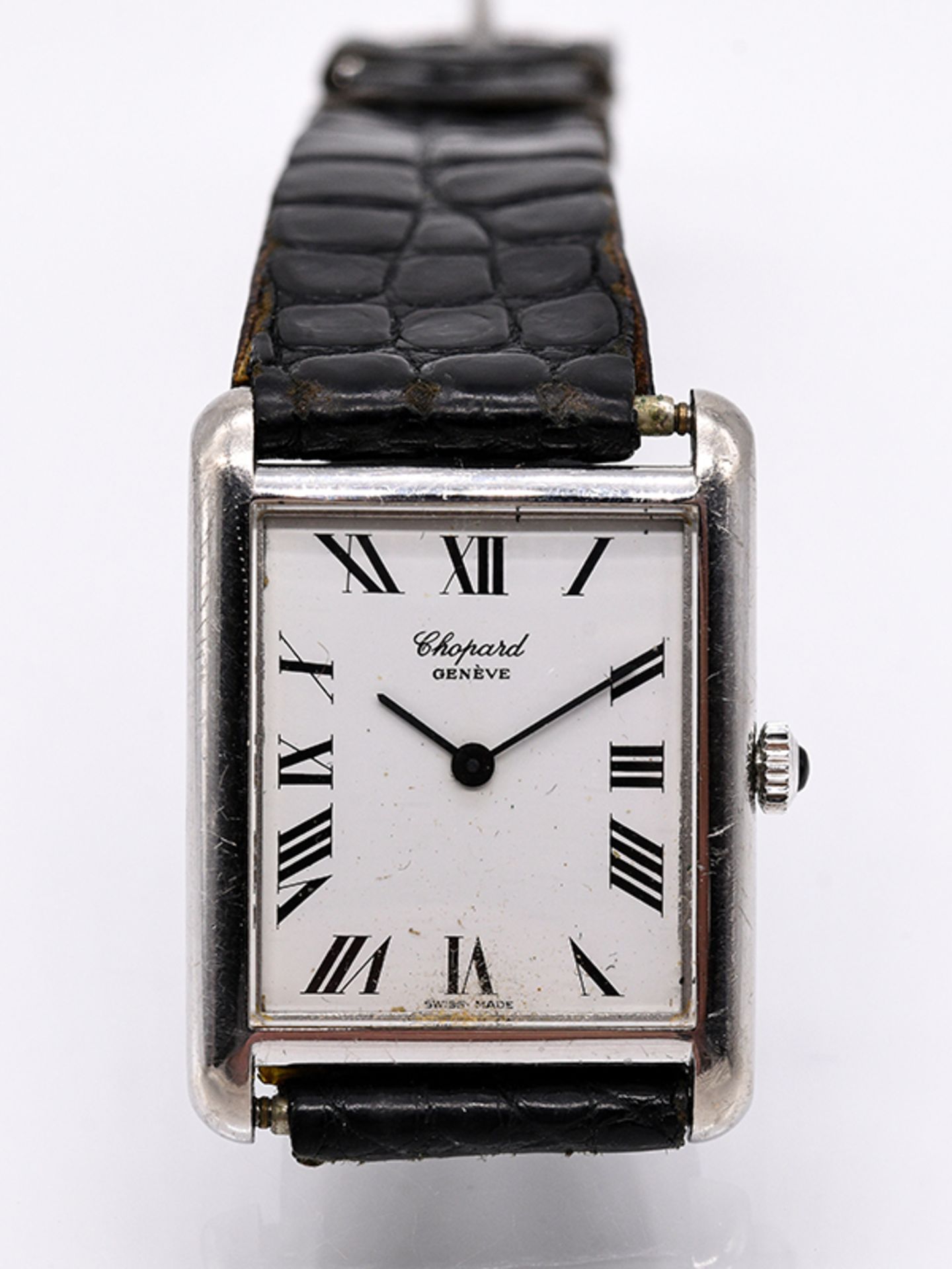 Armbanduhr "Chopard"; Genéve; 80- er Jahre.750/- Weißgold mit Lederarmband. Handaufzug. Rechteckiges