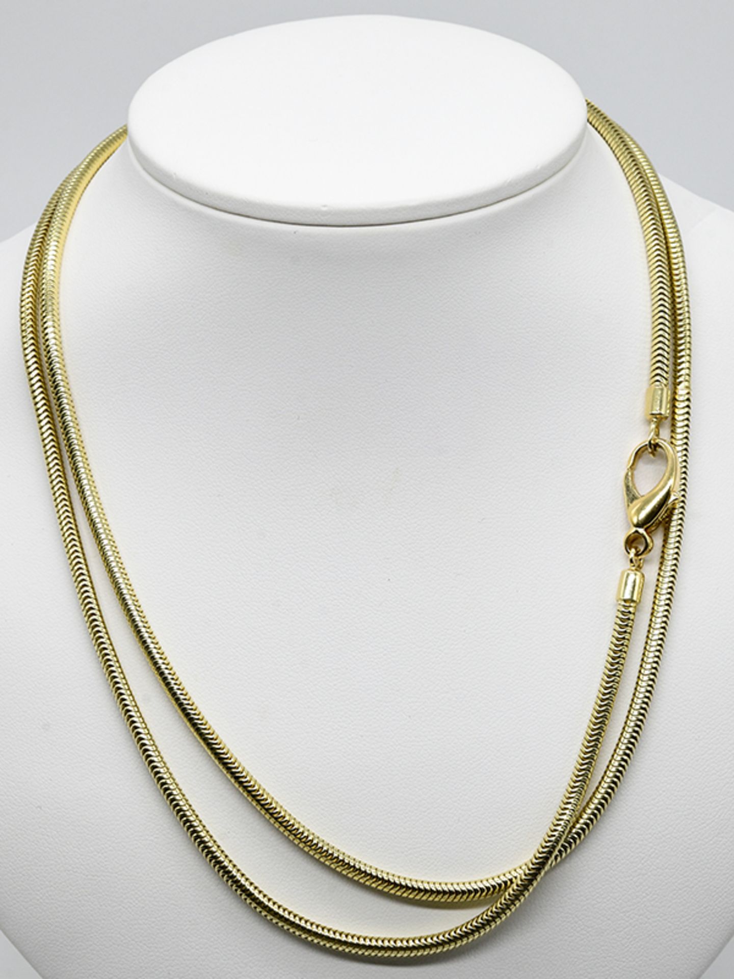 Langes Collier; 80- er Jahre.585/- Gelbgold. Gesamtgewicht ca. 64 g. Schlangencollierkettenmuster.