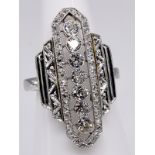 Art Deco-Ring mit 7 Altschliff-Diamanten und 44 Diamantenrosen, zus. ca. 0,9 ct, um 1925. br375/-