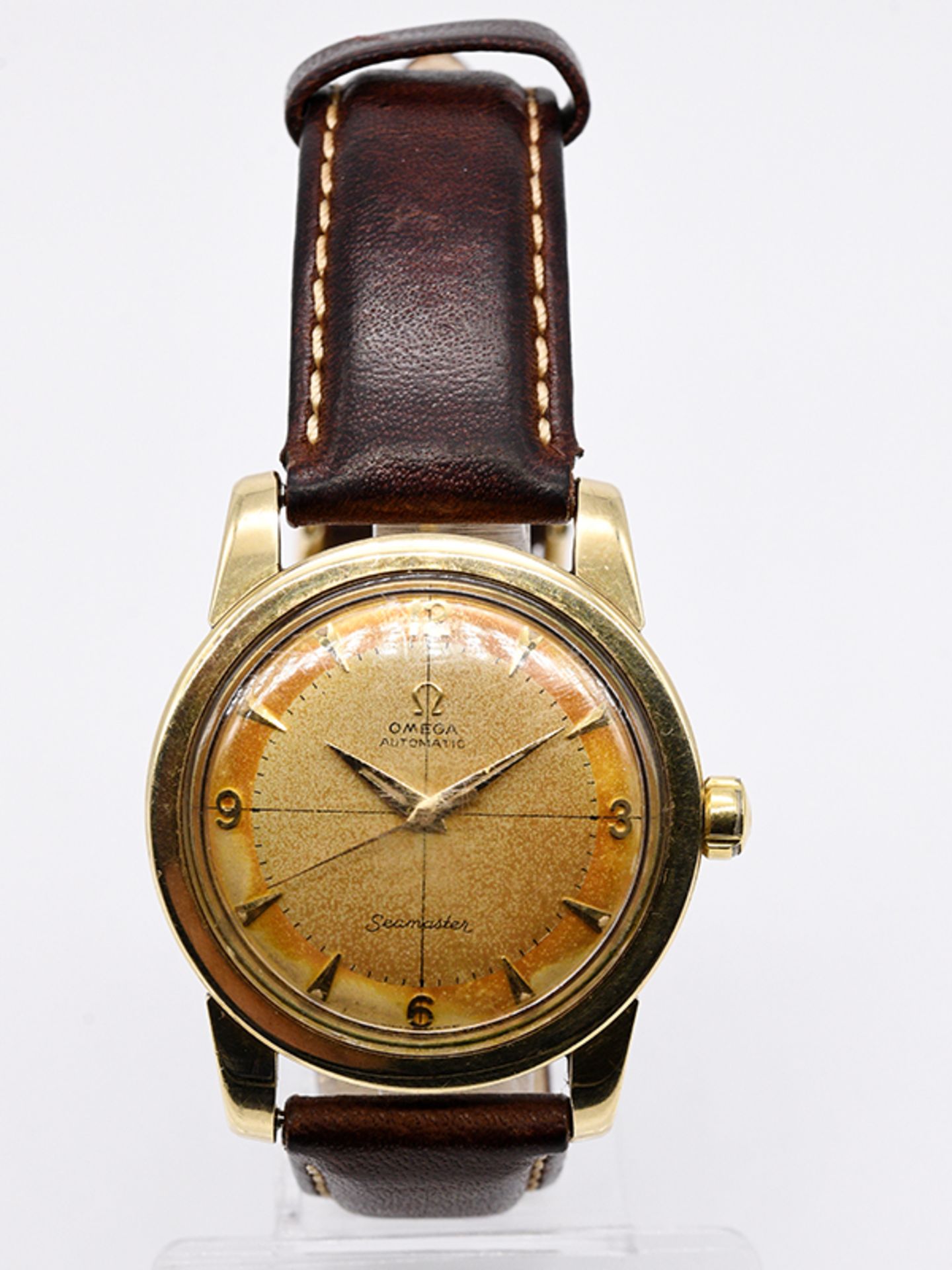 Vintage-Herrenarmbanduhr, Seamaster, OMEGA, 60- er Jahre. br585/- Gelbgold mit Lederarmband (nicht