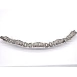 Gliederarmband mit 4 Altschliff-Diamanten, zus. ca. 0,25 ct, amerikanisches Art Deco. br15 kt