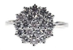 Brillant-Ring, 585er WG, besetzt mit 19 kreisförmig, gestuft angeordneten Brillanten von1,07