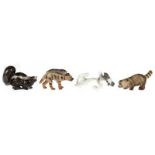4 verschiedene Miniaturfiguren "Hyäne", "Skunk", "Waschbär" und "Hund", Metzler & Ortloff,