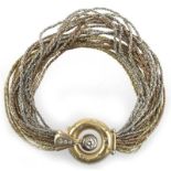 Brillant-Armband, 750/585er GG/WG/RG (geprüft), ausgefasst mit 1 Brillant von 0,50 ct., 4 Br