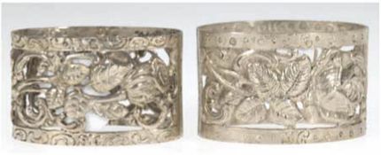 2 Serviettenringe, 835er Silber, ovale Form mit durchbrochenem Rosenmuster, 3x5x3,5 cm
