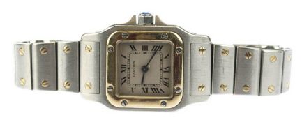 Damen-Armbanduhr "Cartier Santos", Quarzwerk, Edelstahl, Goldlünette, beiges Zifferblatt mit