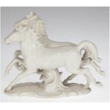Figur "Pferde im Galopp", Schaubach Kunst, unterseitig gemarkt, Bisquitporzellan, H. 14 cm, L