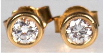 Paar Brillant-Ohrstecker, 585er GG, besetzt mit je 1 Brillanten von zus. ca. 0,34 ct, vsi, Dm. 0,5 