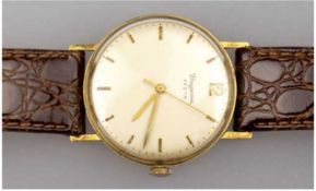Herren-Armbanduhr "Dugena Festa", rundes 585er GG-Gehäuse, Handaufzug, goldene Stabindizes und Zeig
