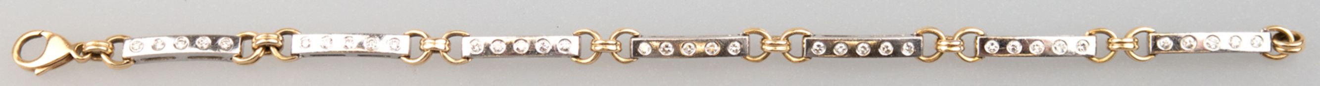 Armband, 585er WG/GG, ges. 13,80 g, besetzt mit 35 Brillanten von zus. 0,70 ct., SI, Karabinerversc