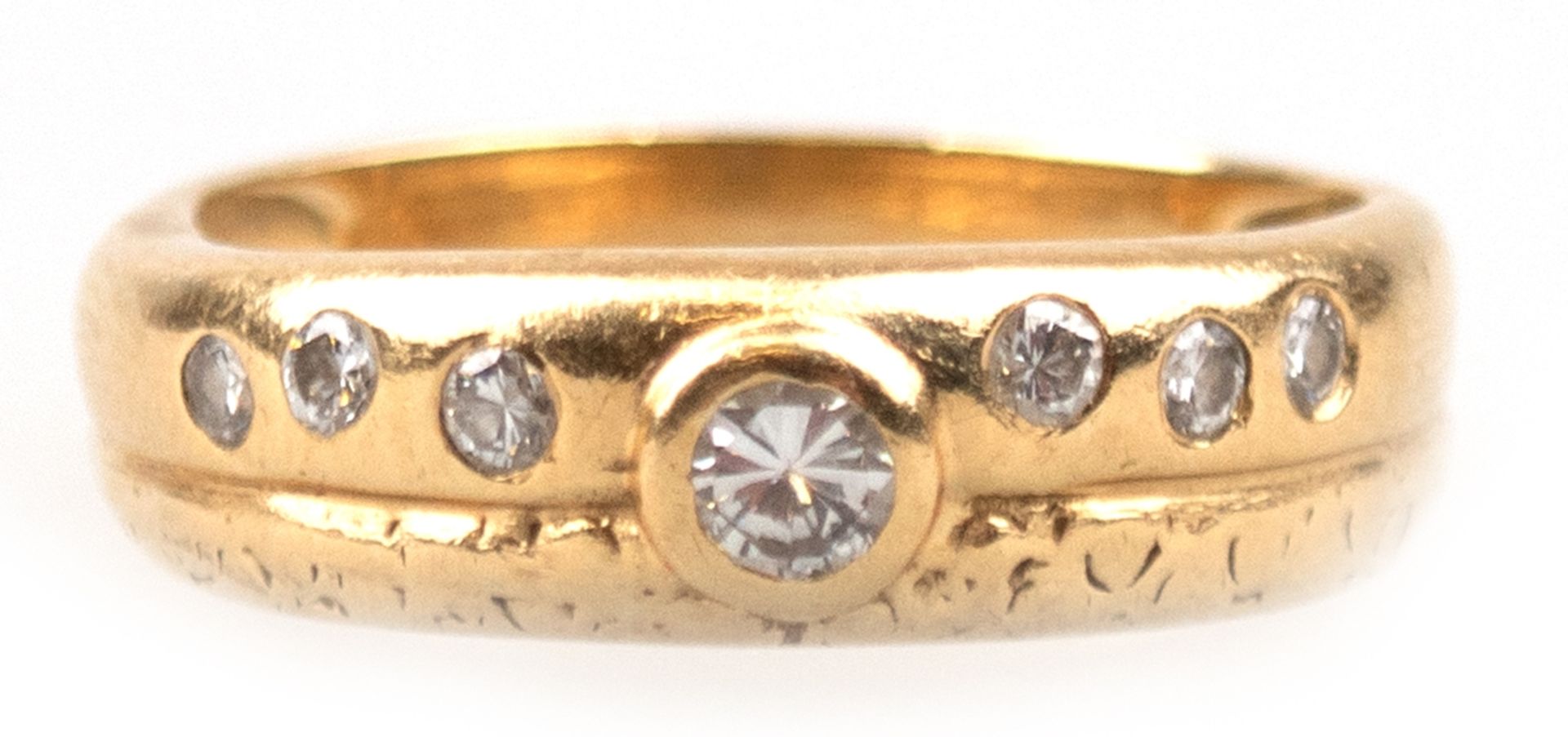 Ring, 585er GG, ges. 4,48 g, besetzt mit 7 Brillanten von zus. 0,28 ct., RG 54