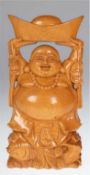 Buddha-Figur "Auf Fisch stehender Glücks-Buddha ein Boot  über dem Kopf haltend", Holz geschnitzt, 