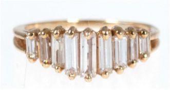 Brillant-Ring, 750er GG, besetzt mit 9 Diamant-Baguettes von zus. 1,10 ct, RG 53,5