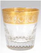 Becherglas, Frankreich, farblos mit breitem, floralem  Goldrand (etwas berieben), z.T. Olivenschlif