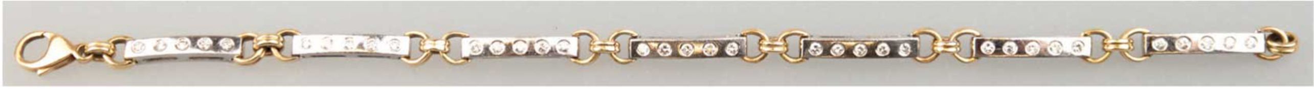 Armband, 585er WG/GG, ges. 13,80 g, besetzt mit 35 Brillanten von zus. 0,70 ct., SI, Karabinerversc