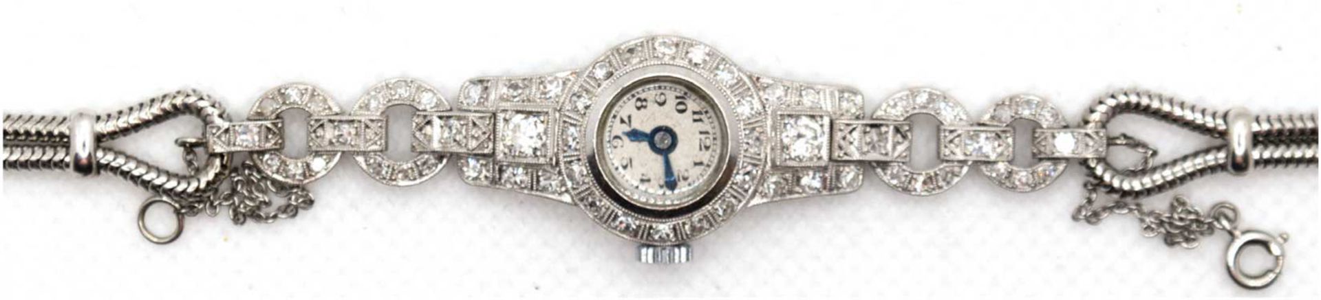 Art-Deco-Armbanduhr, Platin und 585er WG,ausgefaßt mit 60 Diamanten von zus. ca. 2,40 ct,  mechanis