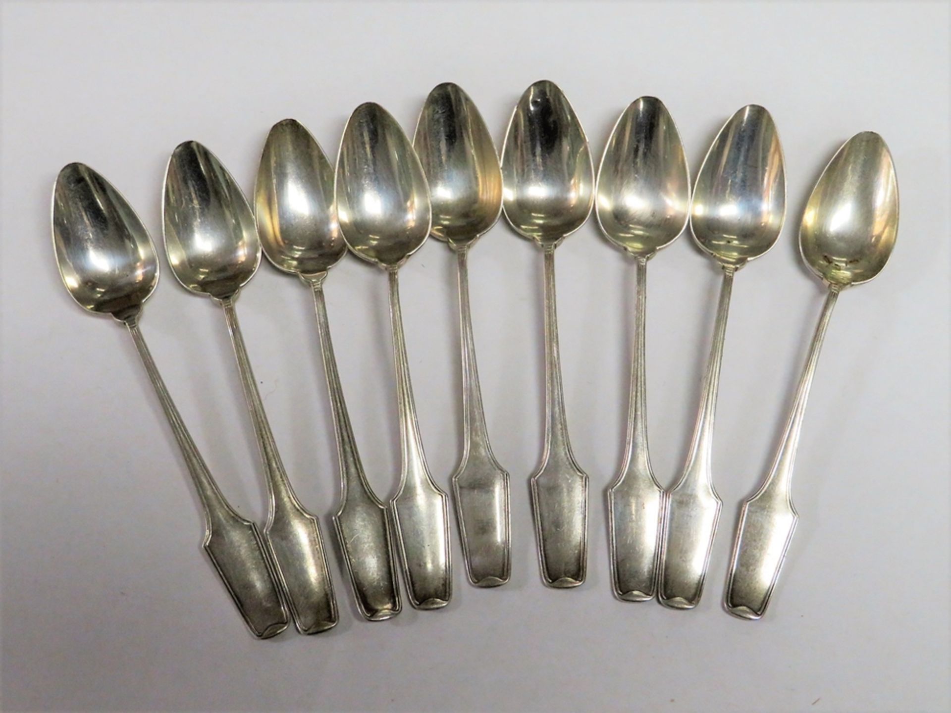 9 Mokkalöffel, um 1900, 835er Silber, gepunzt, 97,8 g, l 11,5 cm.