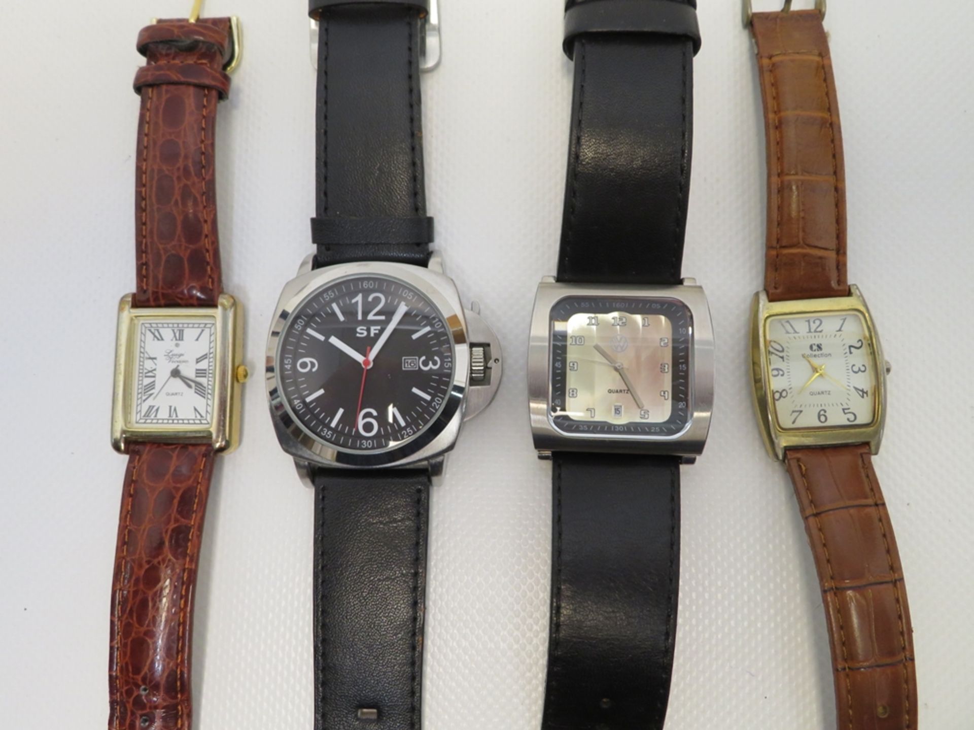 4 diverse Armbanduhren, Quarzwerke,