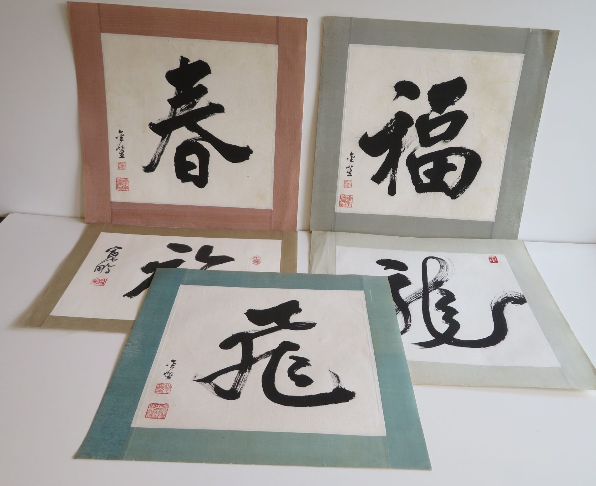 5 Kalligraphien, Japan, um 1900, Tusche auf Papier, sign., ca. 26 x 33 cm, o.R.