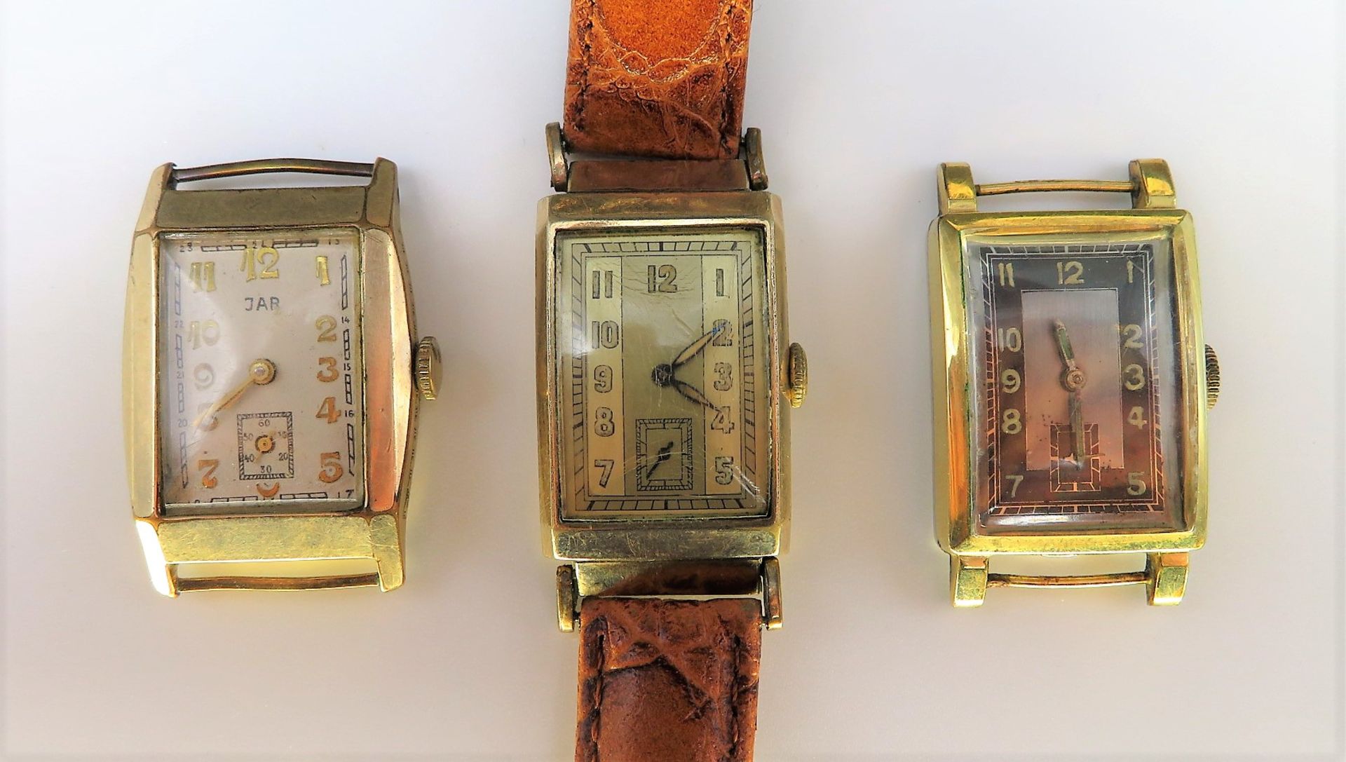 3 diverse Vintage-Armbanduhren, 1930/40er Jahre, vergoldete Gehäuse, Handaufzug, defekt, ca. 2,3 x