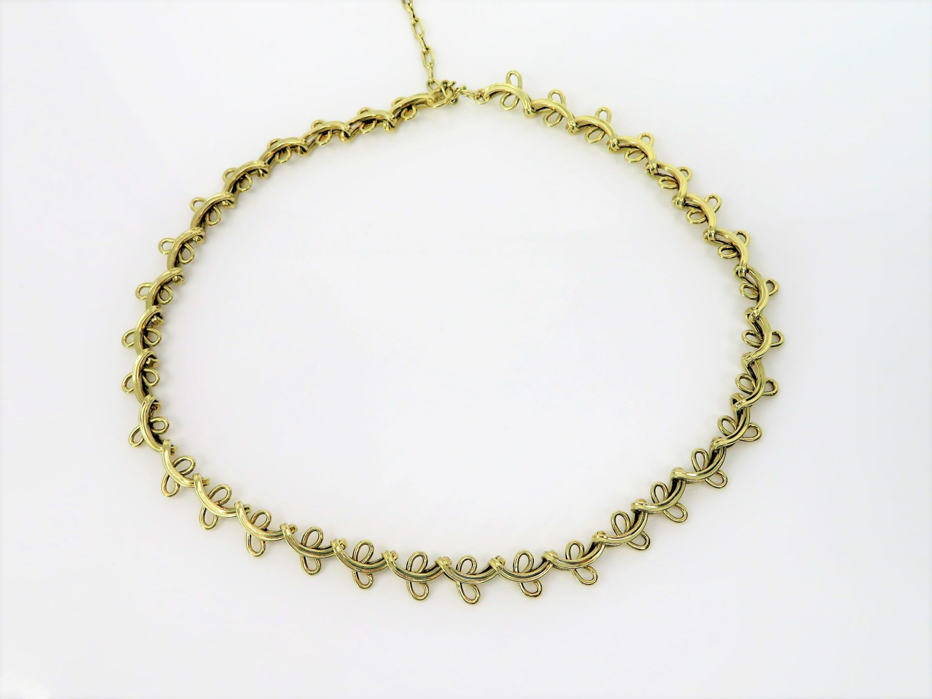 Designer Collier, 1950/60er Jahre, 585er Gelbgold, gepunzt, 25,6 g, l 47 cm, b 1 cm.