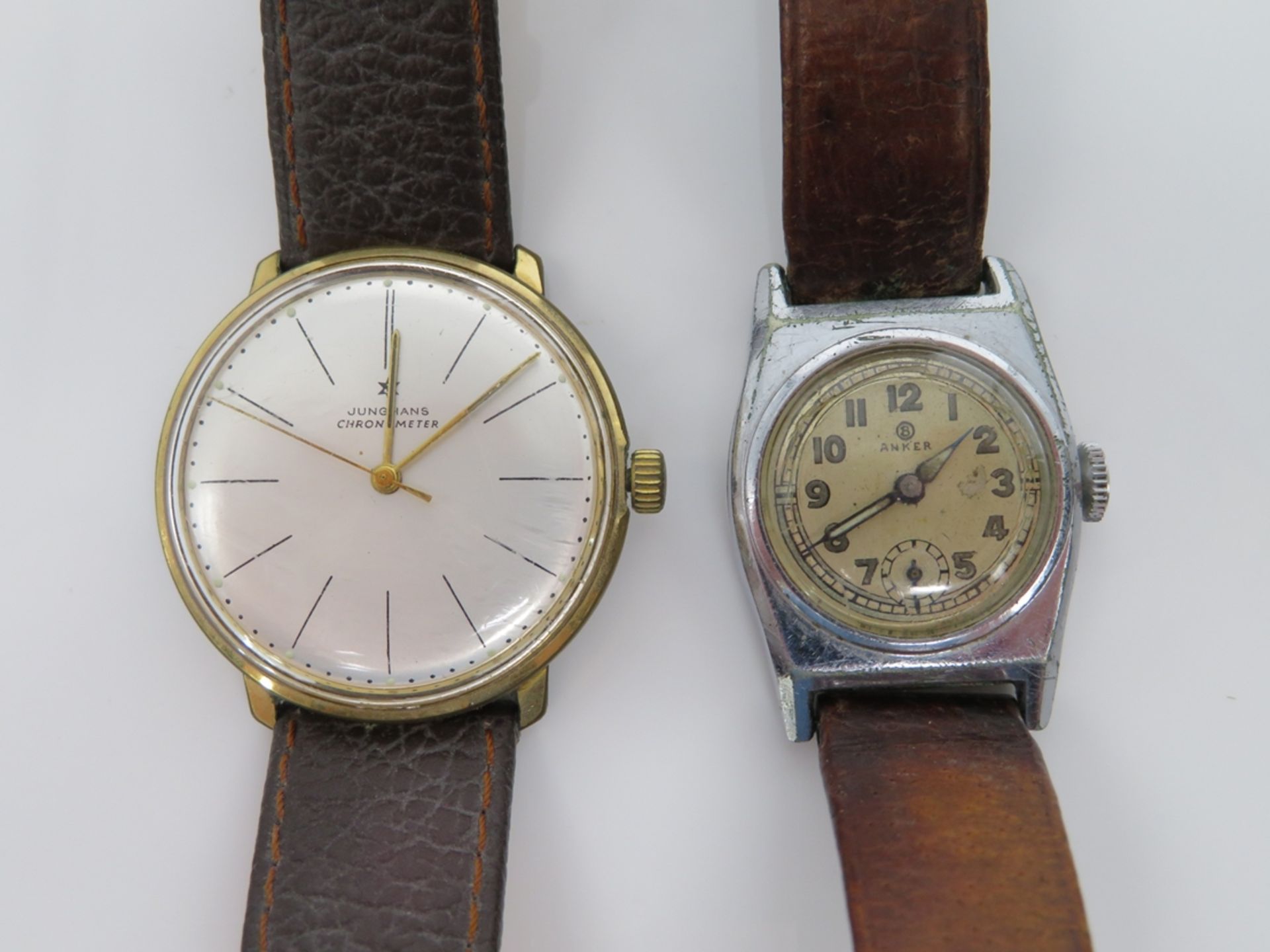 2 Vintage-Armbanduhren, Junghans Chronometer/Anker, vergoldete Gehäuse, Lederband, Gebrauchsspuren,