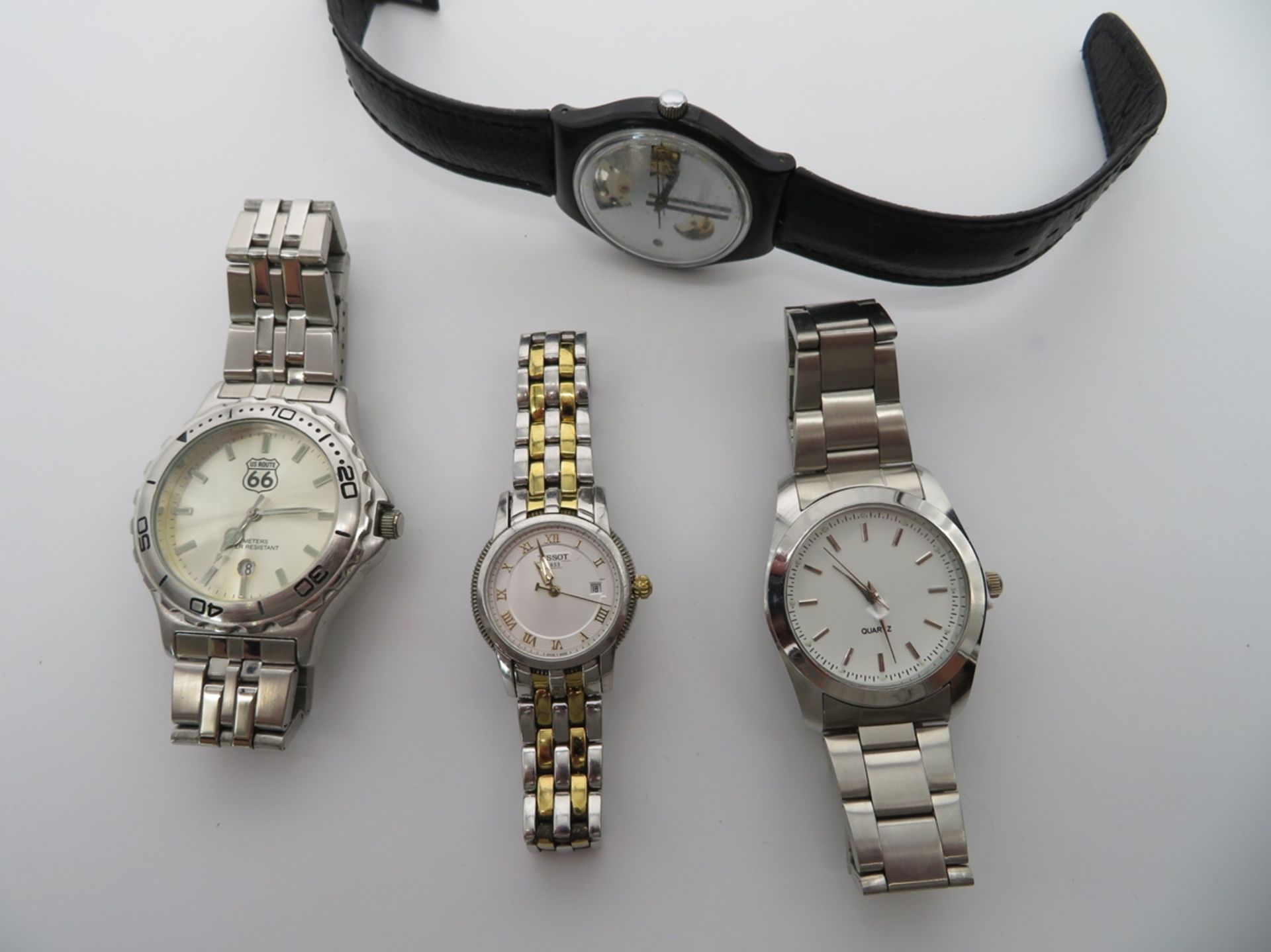 4 diverse Armbanduhren, u.a. Tissot, Swatch, US Road 66, Edelstahl, Quarzwerke.