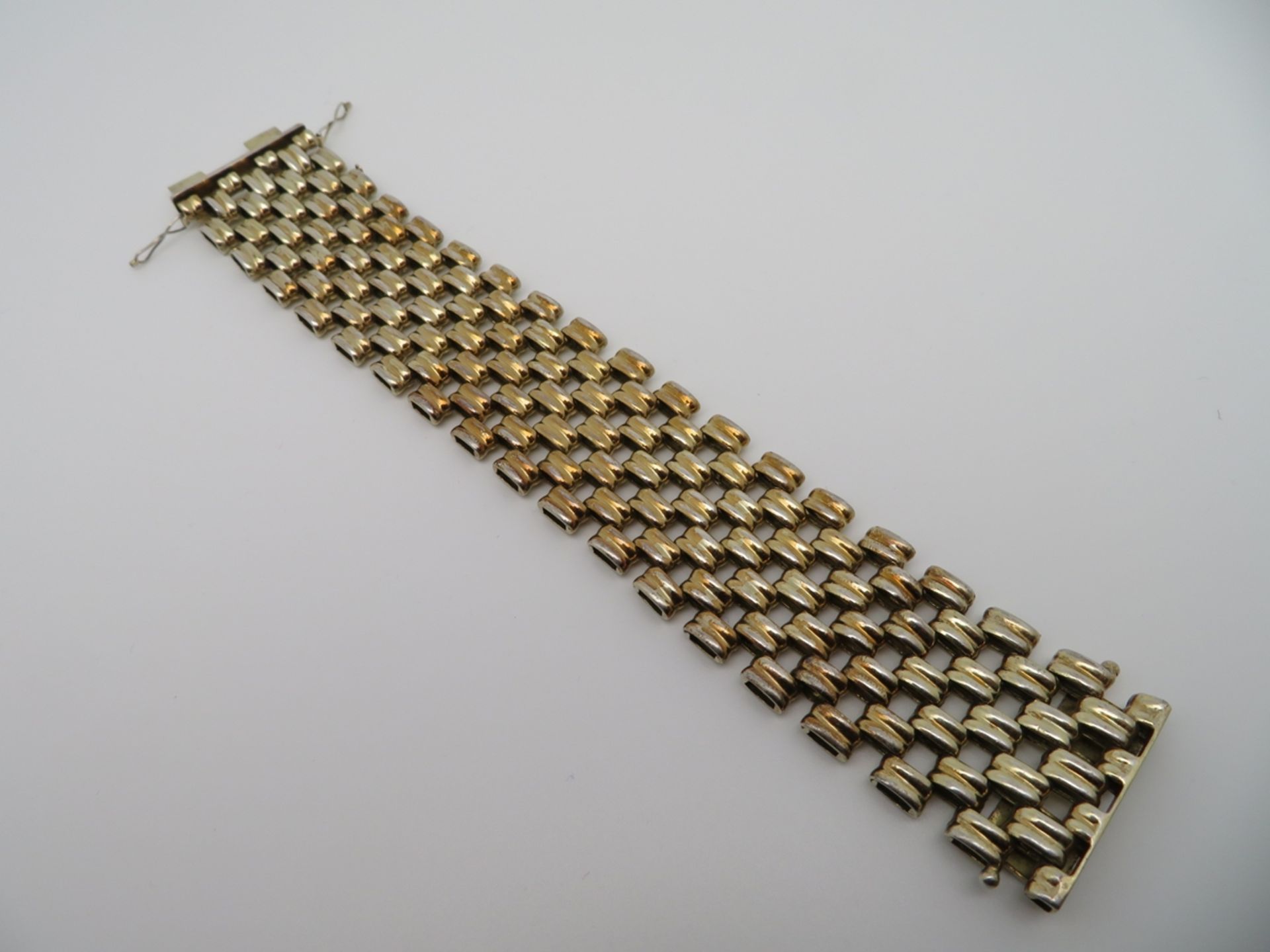 Armband, 1970/80er Jahre, 835er Silber, vergoldet, 61 g, 20 x 3,2 cm.