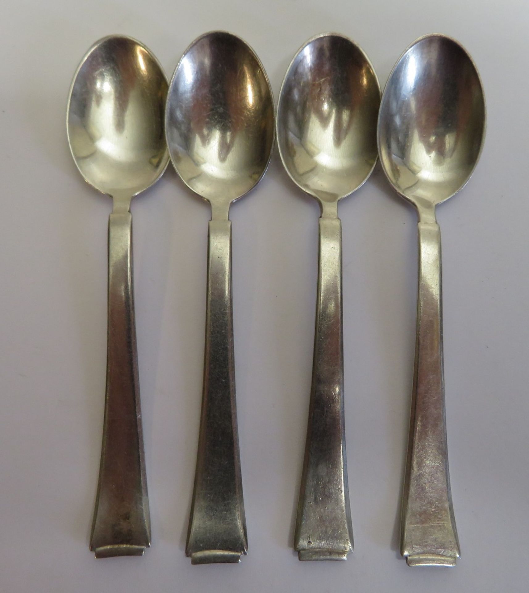 4 Mokkalöffel, WMF, 800er Silber, gepunzt, 57,8 g, gem., l 10,5 cm.