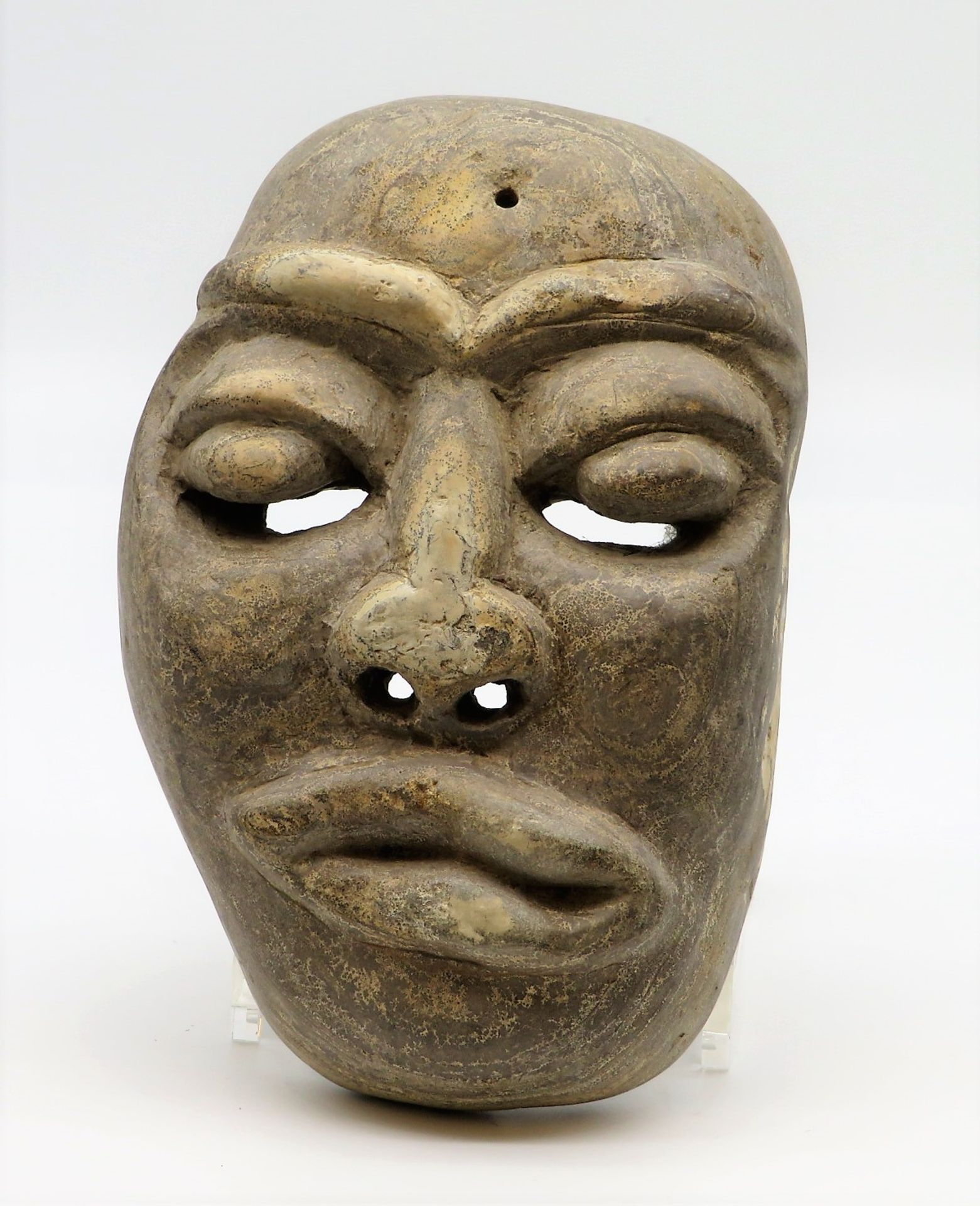 Maske, wohl Afrika, Stein geschnitzt, 21 x 14 x 6 cm.