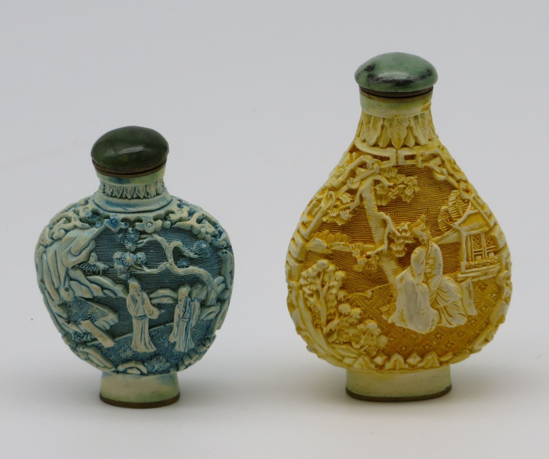 2 Snuffbottles, China, geschnitzt, h 6/7,5 cm.