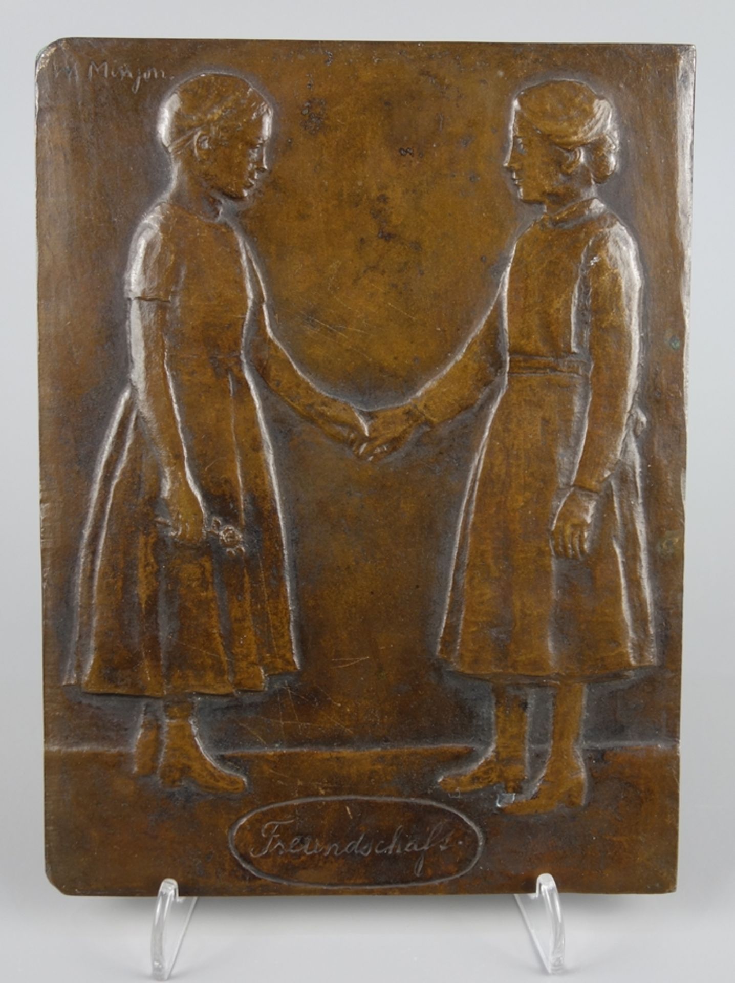 W. Minjon, Bronzerelief "Freundschaft", 1. Hälfte 20.Jh., oben links signiert,