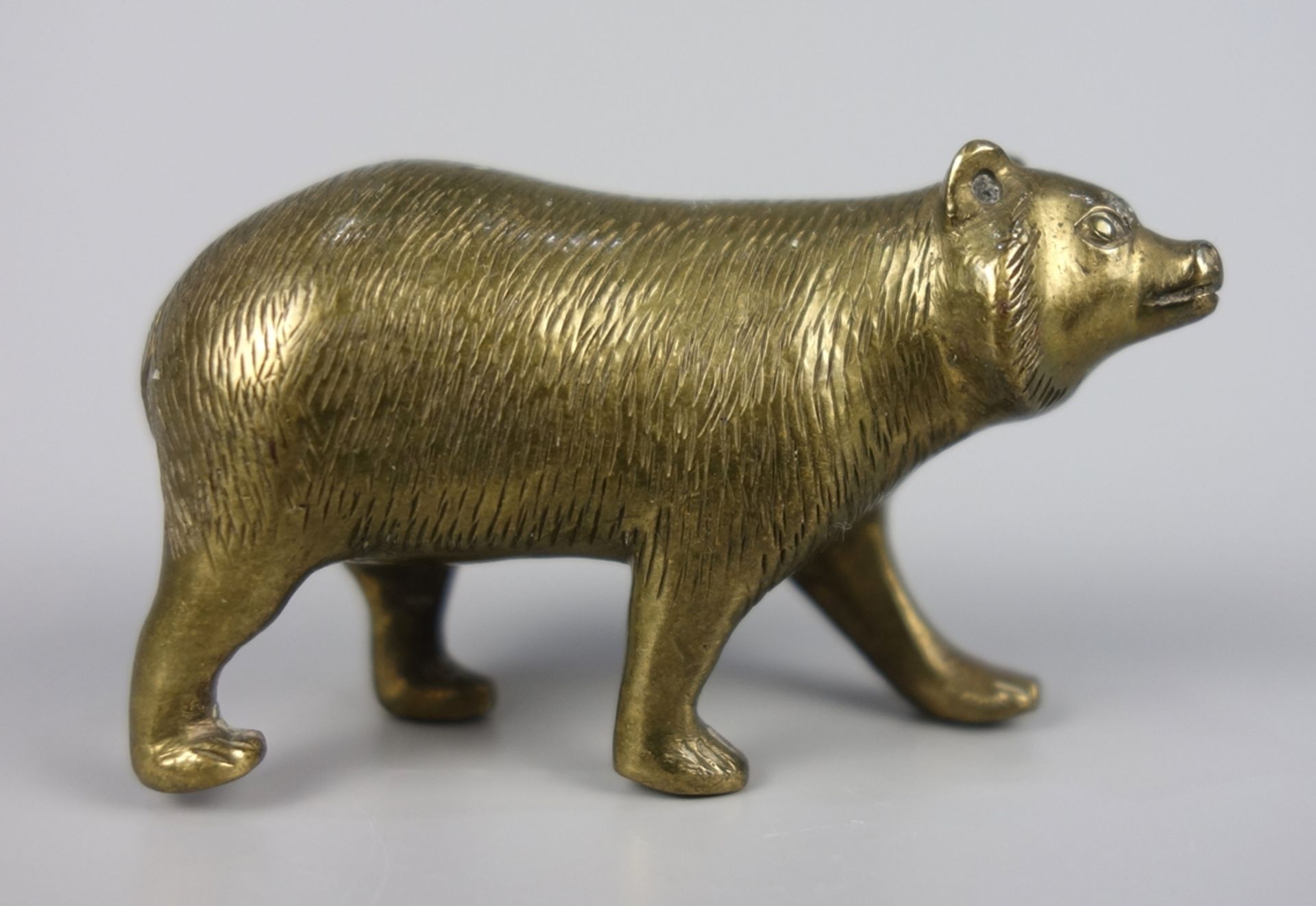 Miniatur "Laufender Bär", Bronze, wohl 1920er Jahre, L.41mm